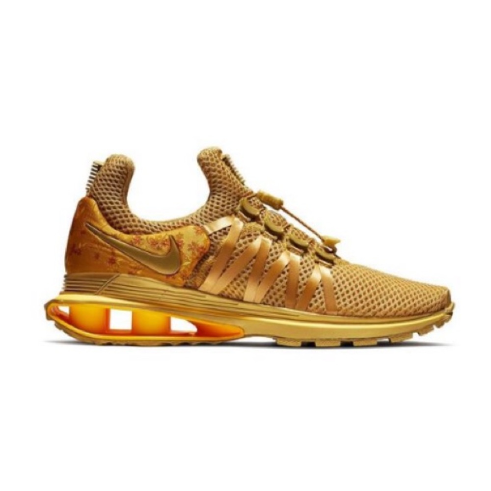NWOT Nike Shox Women in Gold color